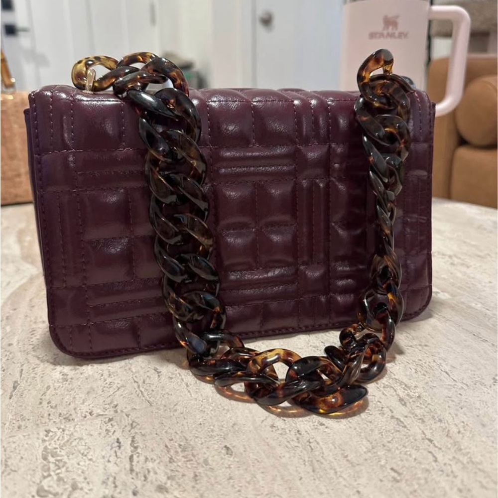 Elegant Purple Quilted Bag with Tortoise Chain